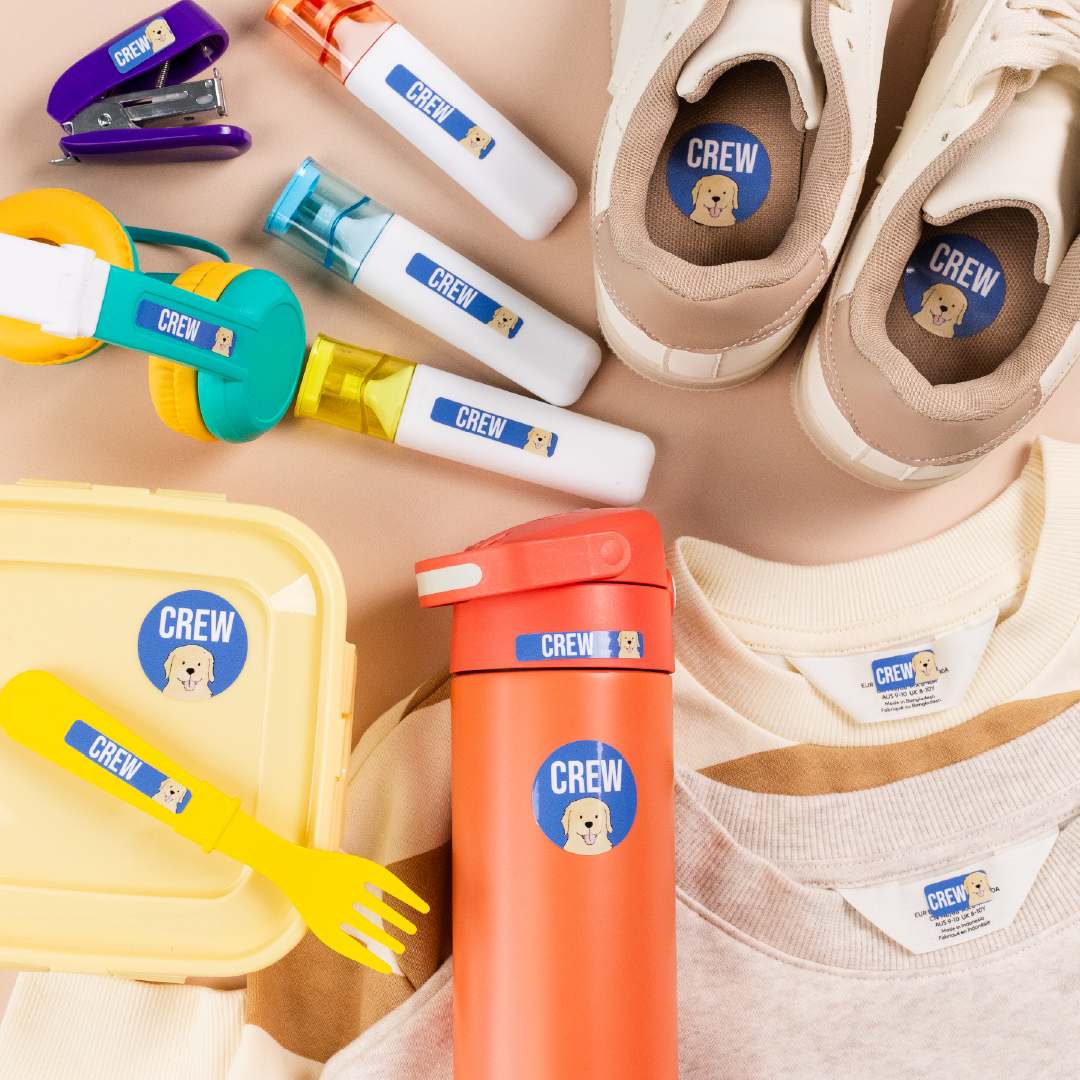 Mabel's Labels name labels on a water bottle, shoes, lunch container, and clothing